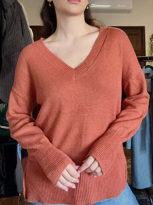 Suéter naranja de cuello V